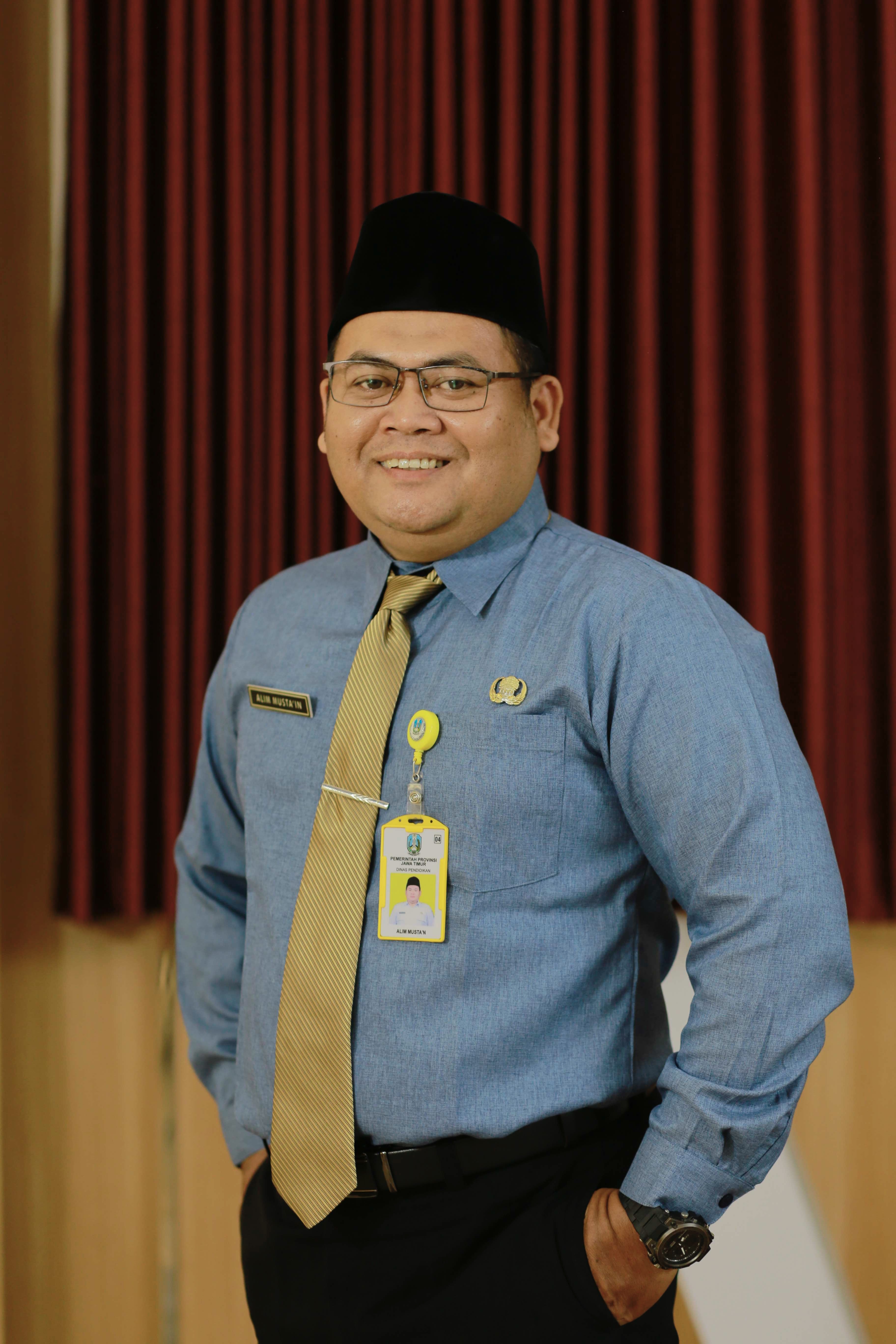 ALIM MUSTA'IN, S.Pd.I., Gr.